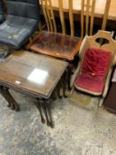 An unusual rocking chair together with two glass topped nests of tables (3)