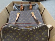 Three replica Louis Vuitton bags
