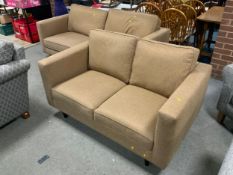 A two piece camel coloured suite