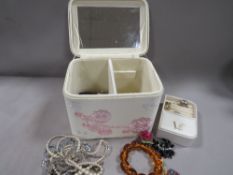 A jewellery box and contents