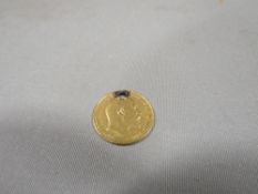A drilled Edward VII half sovereign dated 1902 approx. weight 3.9g