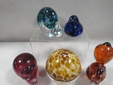 Five assorted glass paperweights to include a snail, Wedgwood examples etc