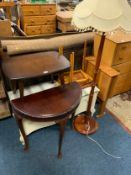 A collection of assorted furniture to include a standard lamp, ottoman, nest of tables etc…(7)