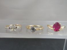 Three hallmarked 9ct gold dress rings, all size L, total weight approx 4.9 g