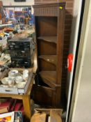 A reproduction oak open fronted corner cupboard