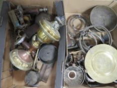 Two trays of assorted metal ware to include an oil lamp base