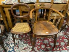 A traditional Elm smokers bow armchair together with an antique bergere bedroom chair. (2)