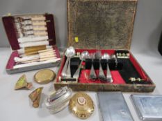 A tray of assorted collectables to include compacts, lipstick holders, cigarette lighters etc