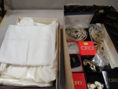 A selection of Ciro and other costume jewellery together with a child's christening outfit ?
