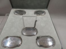 A cased presentation set of hallmarked silver decanter labels consisting of Brandy, Whisky, Port,