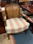 A bergere armchair in the Louis VX style