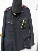 A vintage conductors uniform together with ties, badges, hat etc