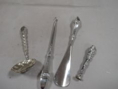 A hallmarked silver handled shoe horn, button hook set, and a sterling silver seal etc
