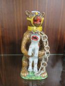 A reproduction bear tea pot