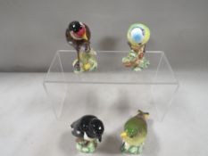 Four Beswick birds