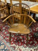 A traditional antique elm Windsor armchair