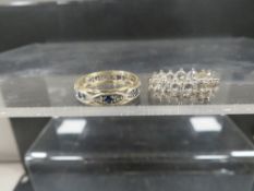 A hallmarked 9ct gold dress ring and 9ct gold & silver eternity ring, both size O, total weight