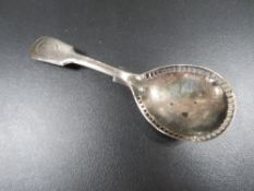 An antique Britannia standard silver caddy spoon