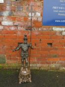 A tall cast metal figure of a continental soldier