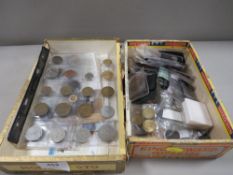 Two boxes of coins and collectables