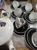 A Royal Albert Masquerade tea set, coffee pot, milk and sugar, cake plate, 6 cups/saucers