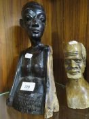 A small carved stone bust of a gentleman together with a treen example