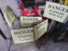 A selection of cleaning signs, floor cleaner and an industrial mop & bucket