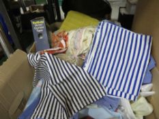 Two trays of assorted pieces of fabric etc