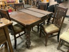 An oak vintage barleytwist wind-out dining table with four oak chairs - Handle