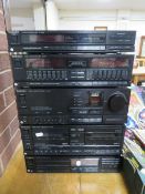 A Technics separates Hi-Fi system comprising a ST X880L stereo tuner, SH-E70 graphics equalizer,