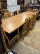 A huge modern oak extending dining table with a set of ten chairs L 200 cm W 100 cm - Extended L 280