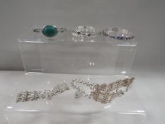 Six assorted silver bracelets and bangles