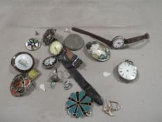 A bag of assorted sundries to include watches, brooches etc to include silver examples