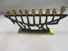 A religious nine candle holder stand