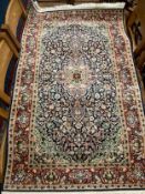 An Eastern silk rug 157 x 93 cm
