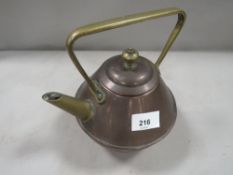 An Arts & Crafts copper and brass kettle by Benham & Froud