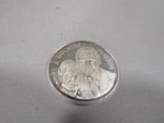 A Duke and Duchess of Winsor coin