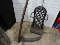 An antique scythe & a cast iron umbrella / stick stand
