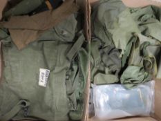 Two boxes of militaria, to include vintage webbing