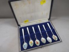 A set of six hallmarked silver enamel floral pattern spoons