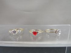 Three hallmarked 9ct gold dress rings, all size R, total weight approx. 5.2g