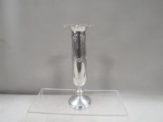 An Edwardian style with bow and swag hallmarked silver specimen vase 