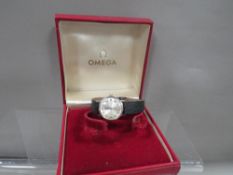 A ladies Omega watch in original box