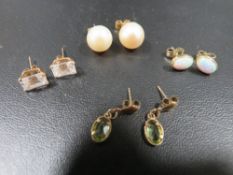 Four pairs of 9ct gold mounted earrings