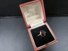 A 18ct gold garnet set ring approx. weight 2.6g