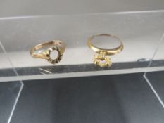 A hallmarked 9 carat gold charm bracelet photograph holder together with a ring mount stamped 10k (