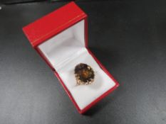 A hallmarked 9 carat gold dress ring set with a smoky quartz approx. weight 7.4g