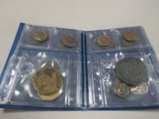 A small album of Roman & other coins