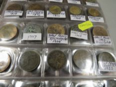 An album of British coins, George III to QE II, include 50p and £2 coins