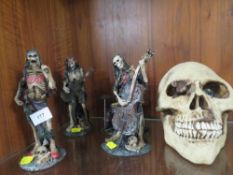 A novelty skeleton band together with a skull